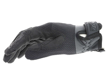 gants Mechanix femme Covert 0.5 noir en main, offrant dextérité et confort optimal.