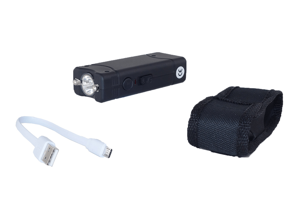 Shocker Mod 801 6 000 000 V avec lampe et housse USB, accessoires incluant un câble USB et une housse de transport.