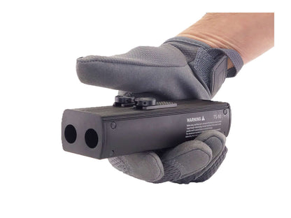 Thunder Stick TS50 Noir Cal. 50 CO2 held by a gloved hand, showcasing its compact design for defense.
